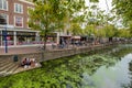 Shopping tourists and students have a sushi lunch at the canal i