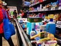 Shopping on the treadmill at the cash register in the supermarket