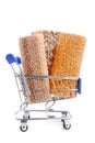 Shopping trolley with carpet isoalted Royalty Free Stock Photo