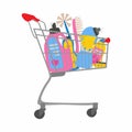 Shopping trolley full of cleaning supplies,sponge for washing dishes and household chemicals for kitchen or toilet, spray and soap Royalty Free Stock Photo