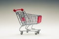 Shopping trolley. Shopping cart. Shopping trolley on multi collored background. Free space for your informations