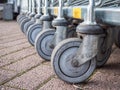 Shopping trolley wheels supermarket background