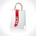 Shopping white paperbag with red ribbon