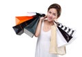 Shopping woman asian happy smiling holding shopping bags isolated on white background Royalty Free Stock Photo