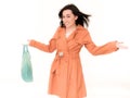 Shopping Woman in Coat Holding Shopping Bag