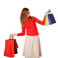 Shopping woman in glasses holding many shopping bags Royalty Free Stock Photo