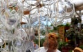 Shopping Woman Among Hanging Glass terrariums Royalty Free Stock Photo