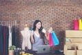 Shopping woman holding shopping bags background, online sales