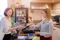 Shopping woman paying with credit card Royalty Free Stock Photo