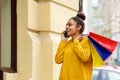 Shopping woman talking on mobile phone Royalty Free Stock Photo