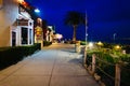 Shops and gardens at Cannery Row at night, in Monterey