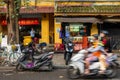 Shops and motocyclist, Hoi an, Vietnam Royalty Free Stock Photo