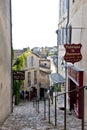 Shops on cobbled medieval steep street in St. Emilion, Aquitaine, Bordeaux, France