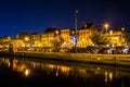 Shops and restaurants at night in Fells Point, Baltimore, Maryland.