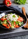 Shopska Salad - Bulgarian salad with tomato, cucumber, pepper, scallion, parsley and cheese Royalty Free Stock Photo