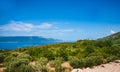 Shore of the Adriatic Sea.In the background in the blur of the island and the mountains. Royalty Free Stock Photo