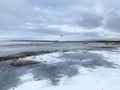 Shore of Beloye White lake in abnormally warm winter of 2020 year. Belozersk, Vologda region, Russia