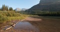 Shore of Fishercap Lake on the Swiftcurrent hiking trail in the Many Glacier region of Glacier National Park in Montana USA Royalty Free Stock Photo