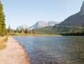 Shore of Fishercap Lake on the Swiftcurrent hiking trail in the Many Glacier region of Glacier National Park in Montana USA Royalty Free Stock Photo