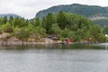 On the shore fjord occasionally are home. Royalty Free Stock Photo