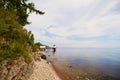 The shore of Lake Baikal on a summer day. Listvyanka Village Royalty Free Stock Photo