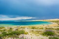 On the shore of Lake Issyk-Kul, Kyrgyzstan. Royalty Free Stock Photo