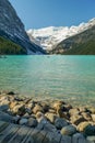 On the shore of Lake Louise in the Canadian Rockies Royalty Free Stock Photo