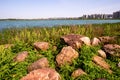 The shore of Songya Lake, piled with huge stones,