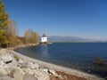 Shore, tower and Rohace mountains Royalty Free Stock Photo