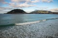 Beautiful shore view on island santa clara in atlantic ocean concha bay, san sebastian, basque country, spain Royalty Free Stock Photo