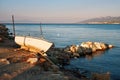 Shored fishing boat, sea and sky at sundown in Urla, Izmir, Turkey