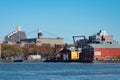 Shoreline of Astoria Queens New York with Industrial Buildings Royalty Free Stock Photo