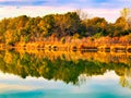 Shoreline fall colors reflections in the lake Royalty Free Stock Photo