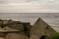 Shoreline Geometry: Seafront Stacks of Concrete Blocks, Where Manmade Forms Meet the Endless Sea Royalty Free Stock Photo