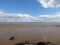 Looking across mudflats to sea