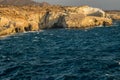 Shoreline of Sarakiniko beach in the morning sunrise, Milos island Royalty Free Stock Photo