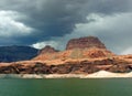 Shorelne with sandstone buttes on Lake Powell of Lake Powell. Royalty Free Stock Photo