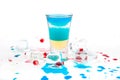 Short blue coctail with ice and color drops Royalty Free Stock Photo