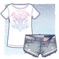 Short denim shorts and T-shirt with vintage looking eclectic print