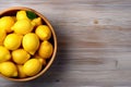 Short food supply chains SFSCs. From garden to plate concept. A bowl of fresh lemons on the wood table