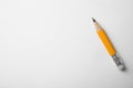 Short graphite pencil on white, top view Royalty Free Stock Photo