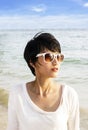 Short hair Asian woman on the beach