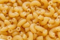 Short Italian pipe pasta. Pasta is delicious Italian traditional food made from wheat flour like noodles.Dry pasta background.Top