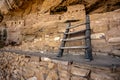 Short Ladder Connects Levels of Cliff Dwelling Royalty Free Stock Photo