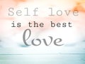 Text says Self love is the best love, pastel color background.