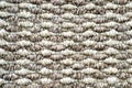 Short pile brown beige carpet texture background. Wicker carpeting, lint-free carpet, top view of door mat
