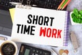 SHORT TIME WORK. text on white paper on gray background Royalty Free Stock Photo