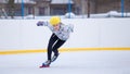 Speed skating young girl on training rink Royalty Free Stock Photo