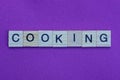 Short word cooking made of gray wooden letters