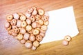 Shortbread heart with blank card Royalty Free Stock Photo